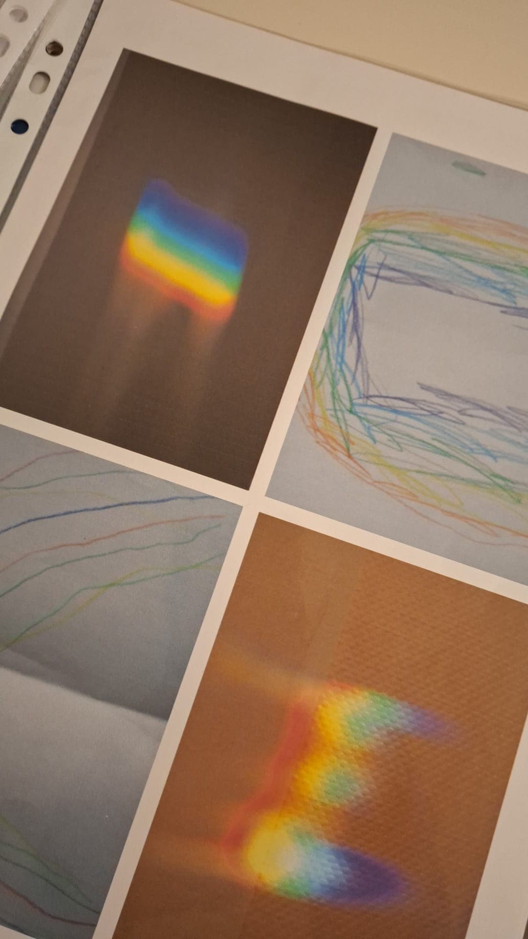 Vier Blätter mit Regenbogenfarben, Fotografien und Kinderzeichnungen